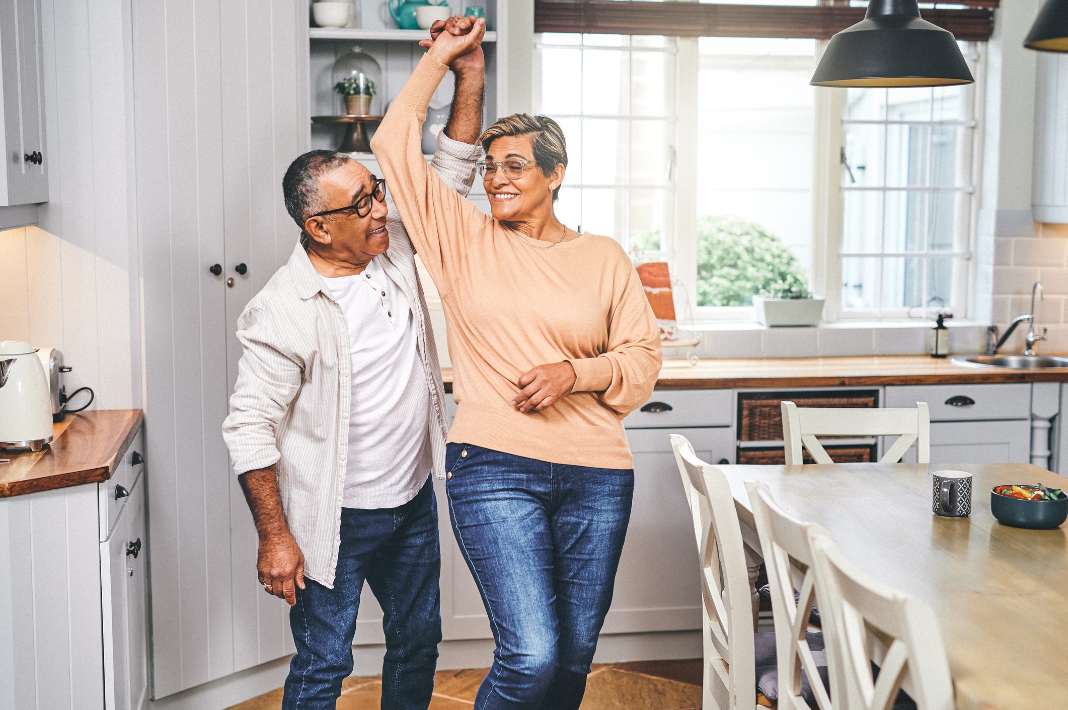seniors dancing in kitchen