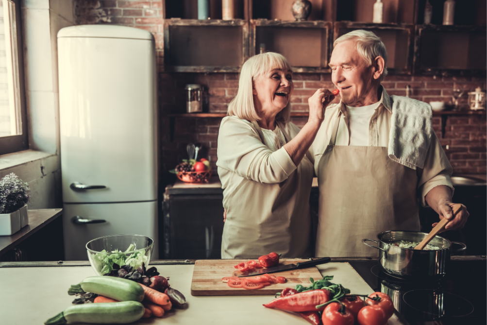 bone-health-1-2 Couple cooking dinner together