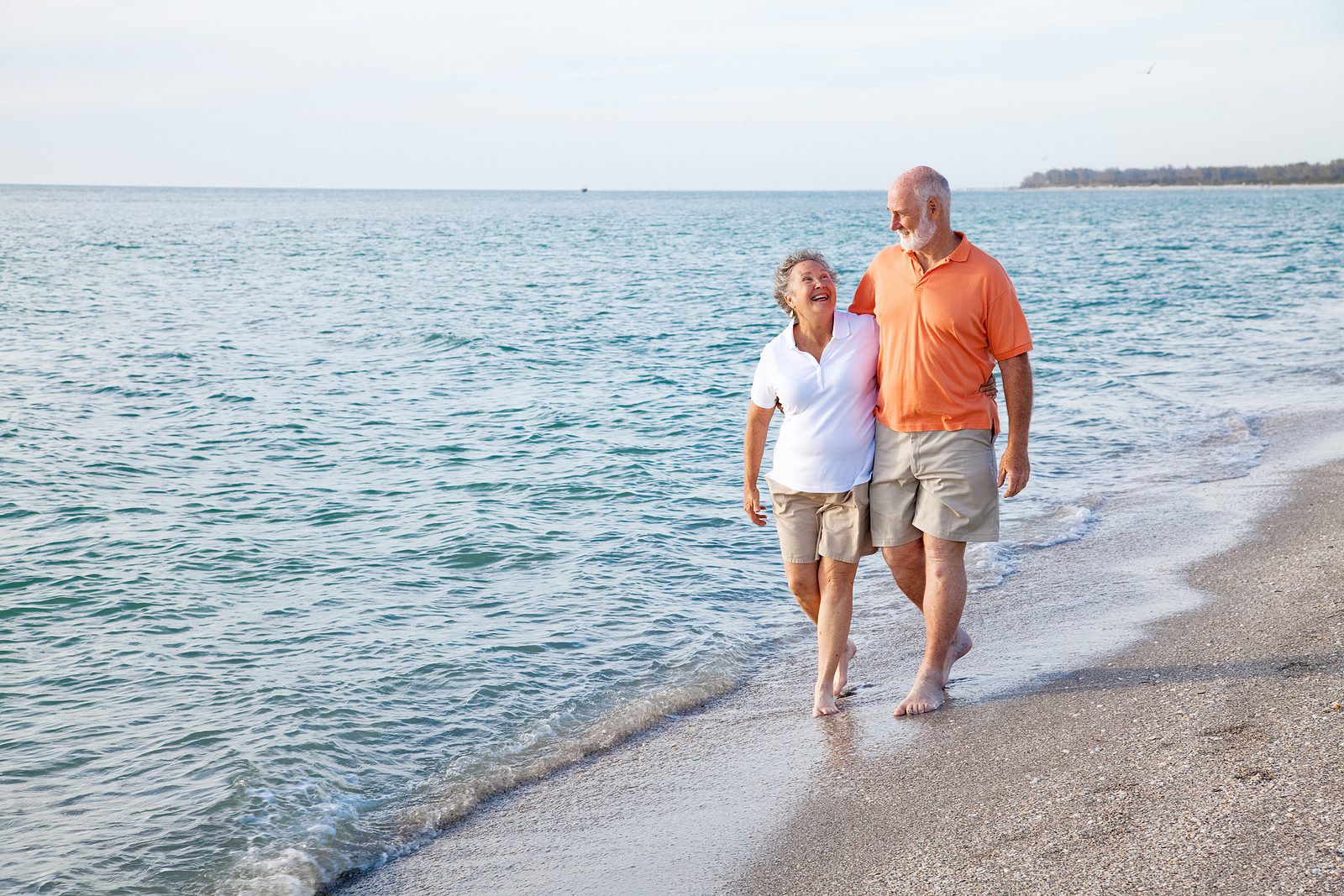 Couple walking on the beach